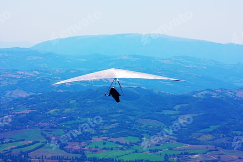 Preview: Hang Glider Pilot In Italian Mountains