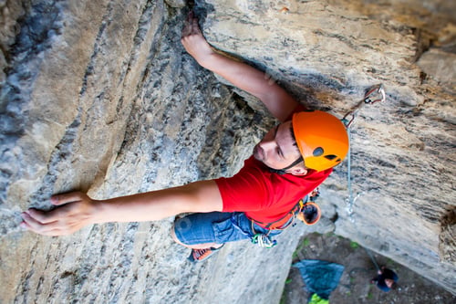 Preview: Climber In A Helmet Climbs To The Top Of The Mountain. Sport Activities In Nature.