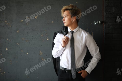Preview: Young Asian Businessman In Classic White Shirt And Tie