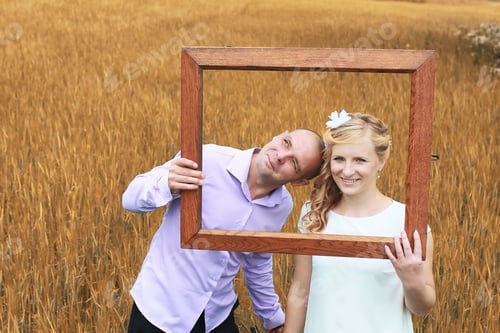 Preview: Just Married Lovers Walking In Field In Autumn Day