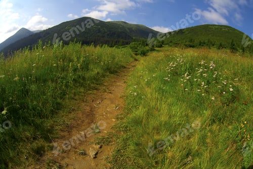 Preview: Summer Landscape In Mountains And The Dark Blue Sky With Clouds