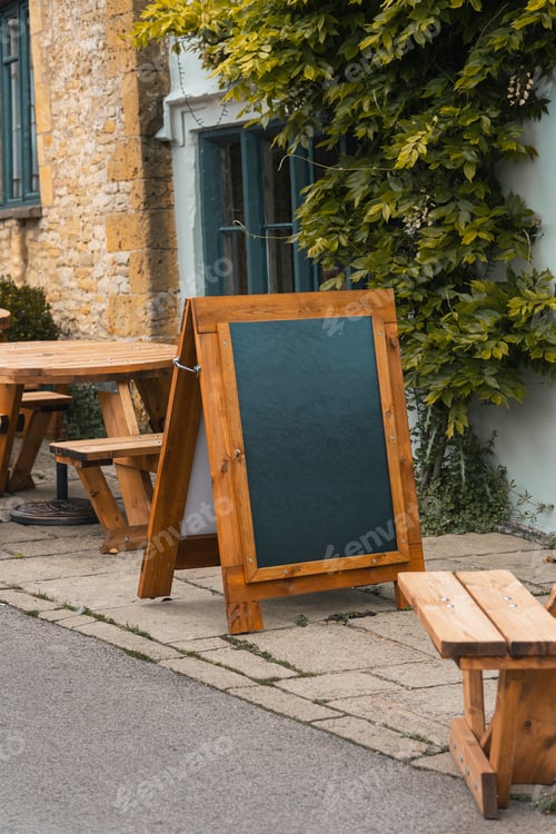 Preview: A-Board advertisement sign with chalk board outside of a restaurant cafe pub