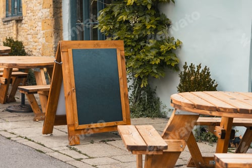 Preview: A-Board advertisement sign with chalk board outside of a restaurant cafe pub