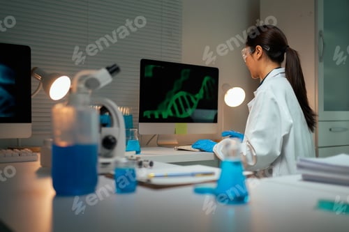 Preview: Scientist analyzing DNA sequence data in modern laboratory