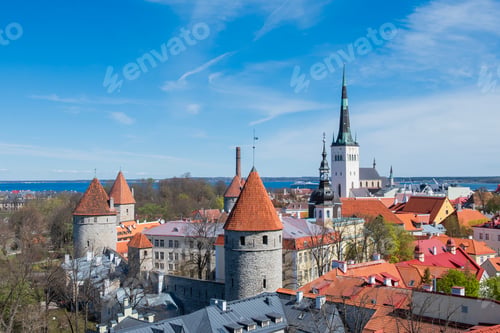 Preview: Beautiful panoramic view of Tallinn Old Town with medieval fortress towers, red tiled roofs, and the