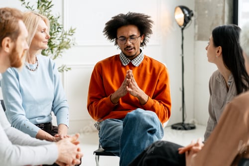 Preview: Diverse people participating in mental health support group