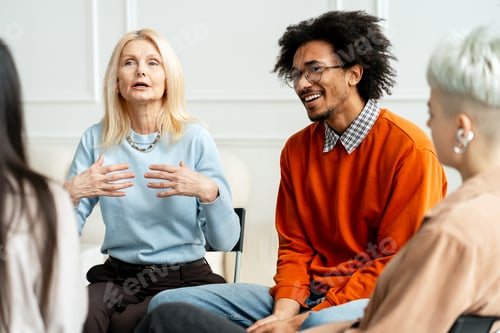 Preview: Diverse people sharing personal stories in a support group