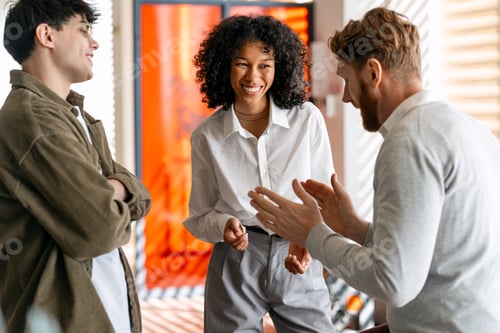 Preview: Diverse startup team discussing ideas and collaborating in office