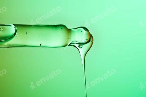 Preview: Pdrn serum dropping from pipette for skin care and regenerative beauty