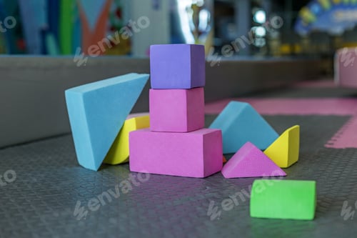 Preview: Colorful foam blocks arranged on floor at indoor playground
