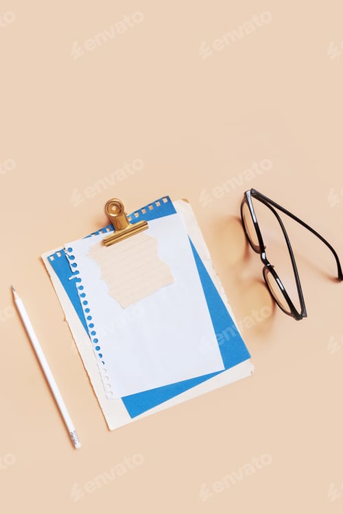 Preview: Blank sheet paper notebook on colored background top view. Flat lay