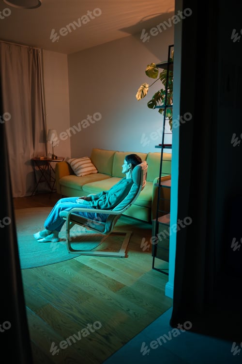 Preview: Tired tranquil senior woman sleeping in chair in room, life problems taking away energy and strength