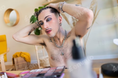 Preview: Young person applying makeup and styling hair