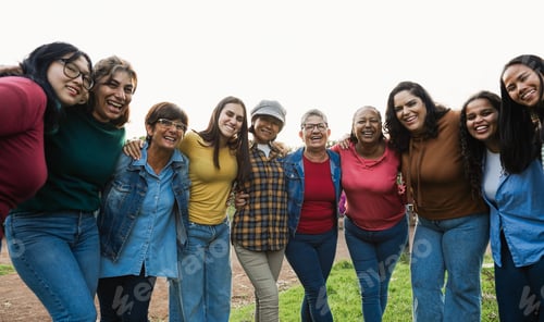 Preview: Multigenerational women smiling in front of camera