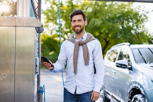 Preview: Man Paying at Car Wash With Phone