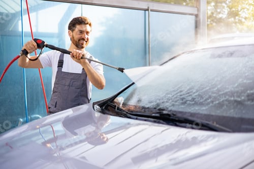 Preview: Man Washing Car with Pressure Washer