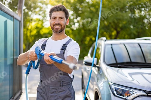 Preview: Man Washing Car with Pressure Washer