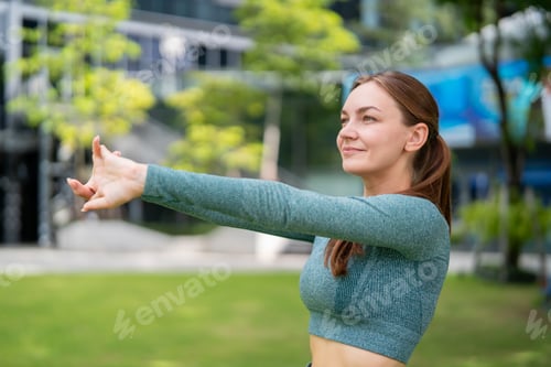 Preview: Caucasian young sportswoman warm up and exercise on the rooftop garden.