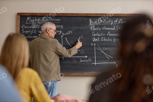 Preview: Senior Man Teaching Economics Concepts in Classroom Lecture