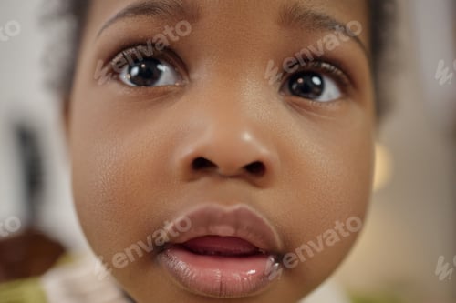Preview: Portrait of Black Child in Context of Poverty and Family Hardship
