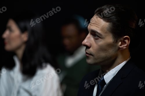 Preview: Adult Businessman Listening during Corporate Meeting or Seminar