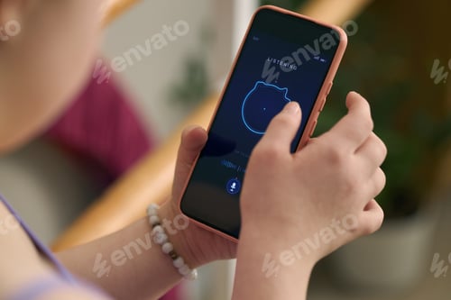 Preview: Girl with Down Syndrome Using Smartphone Voice Control for Access