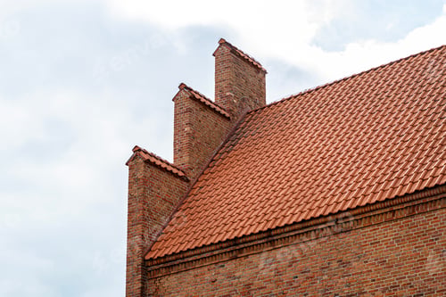 Preview: Medieval castle architecture showing red brick wall and roof tiles