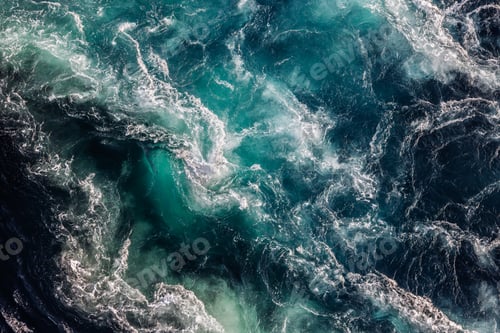 Preview: Blue waves of water of the river and the sea meet each other during high tide and low tide.