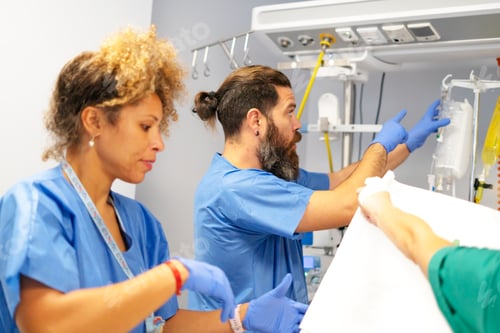 Preview: Medical team collaborating in hospital delivering patient care