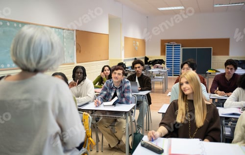 Preview: Teacher lecturing diverse students in a high school classroom