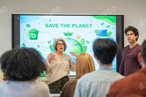 Preview: Teacher discussing save the planet with students in a classroom setting
