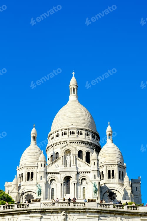 Preview: The Sacré-Cœur Basilica on Montmartre Hill Under a Clear Blue Sky in Paris, France