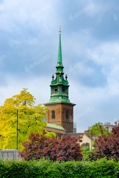 Preview: All Hallows by the Tower Church Brick Bell Tower and Green Copper Spire in London United Kingdom