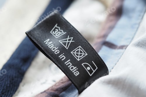 Preview: Clothing care label showing washing instructions and origin