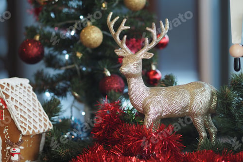 Preview: Holiday decorations with a reindeer and gingerbread house