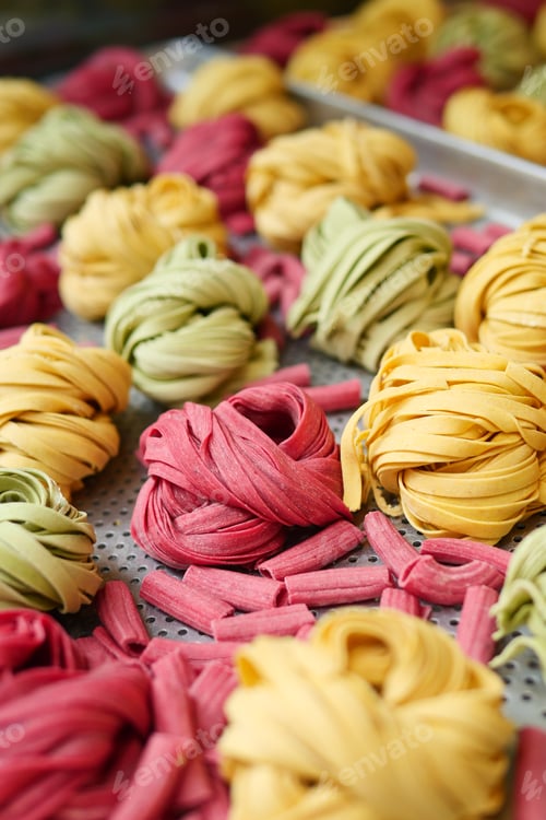 Preview: Fresh pasta shapes displayed on a kitchen surface