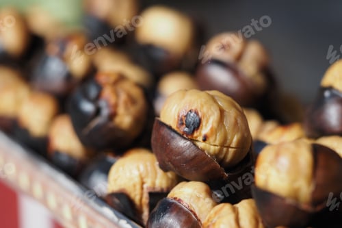 Preview: Fresh roasted chestnuts for sale at a local market stall
