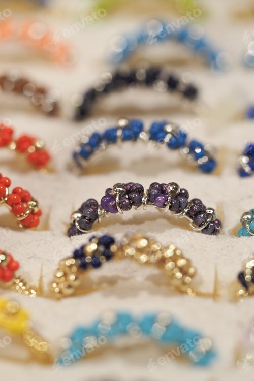 Preview: Colorful rings displayed in a jewelry store showcase