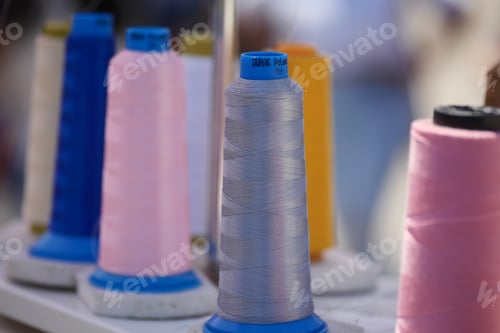 Preview: Collection of spools of thread in a craft market setting