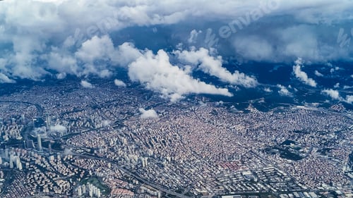 Preview: View of a city from above during a cloudy day