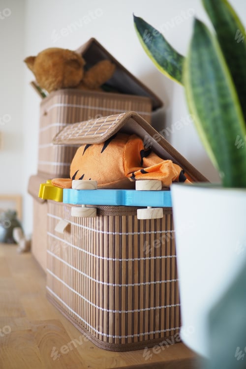 Preview: Storage bins in the living room hold toys and plushies