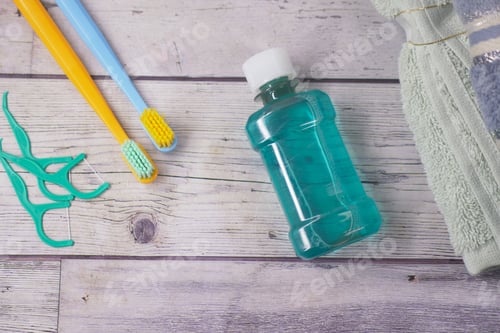 Preview: Daily dental care routine with toothbrush and mouthwash