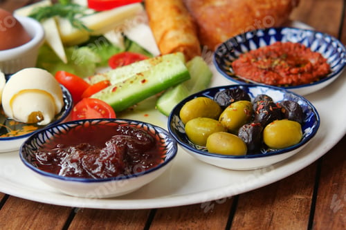 Preview: Delicious turkish breakfast served on a plate at a restaurant table