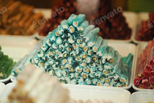 Preview: Colorful turkish delight stacked in a market display