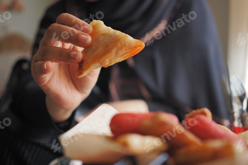 Preview: Enjoying warm samosas in a cozy atmosphere