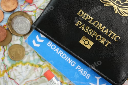 Preview: Travel preparation with passport and boarding pass on map