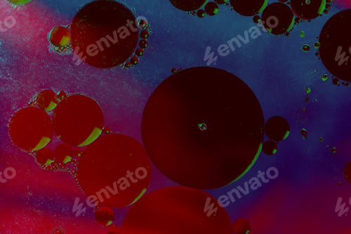 Preview: Oil drps in a water .Abstract bubbles on a spotty background. Distortion in water with oil droplets.