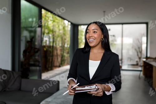 Preview: Real estate agent inspecting a house for sale