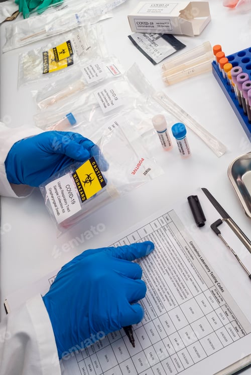 Preview: Nurse comparing positive covid-19 test results of infected persons, selecting codes on label accordi