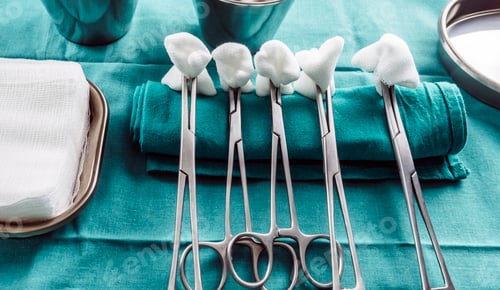 Preview: Scissors surgical with torundas in an operating theater, composition horizontal, conceptual image
